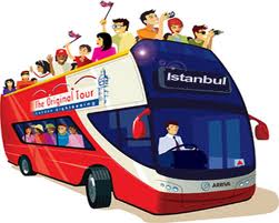 "A crowded sightseeing bus on a busy street..."